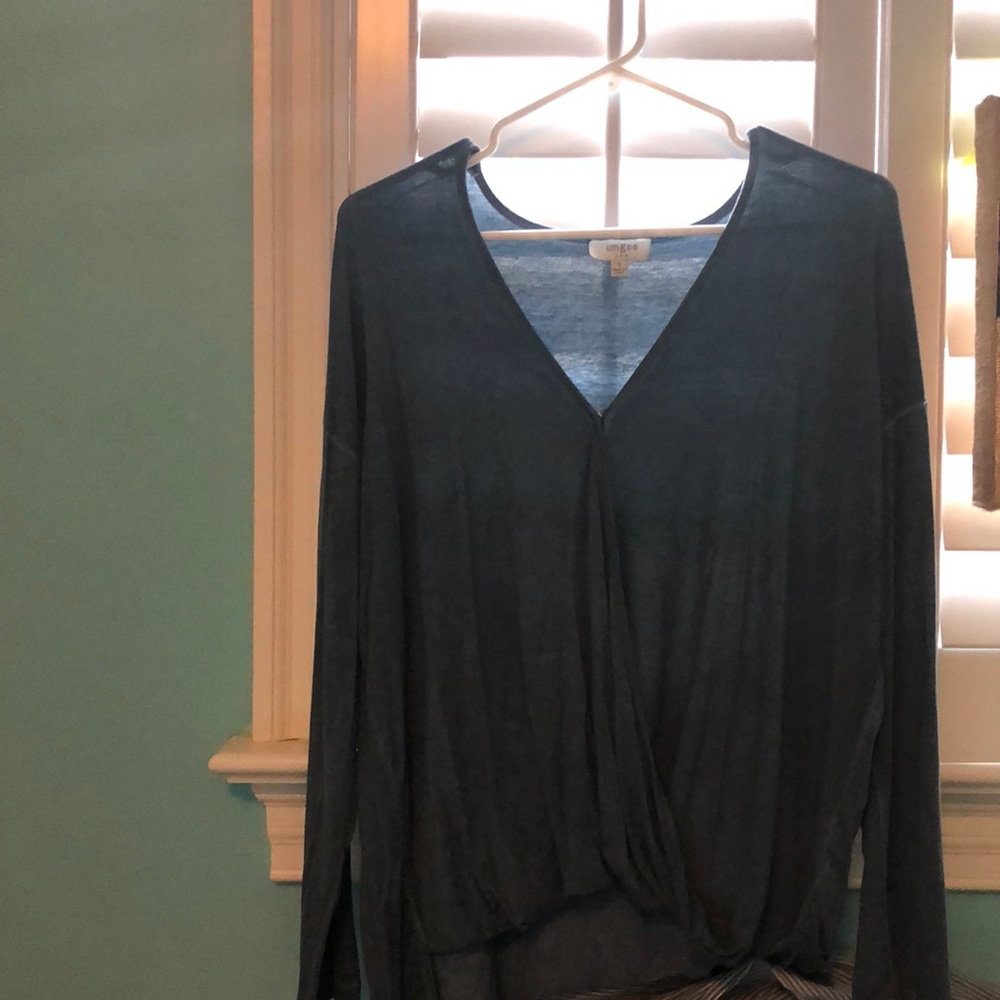 Blue ish gray top with v neck and long sleeves